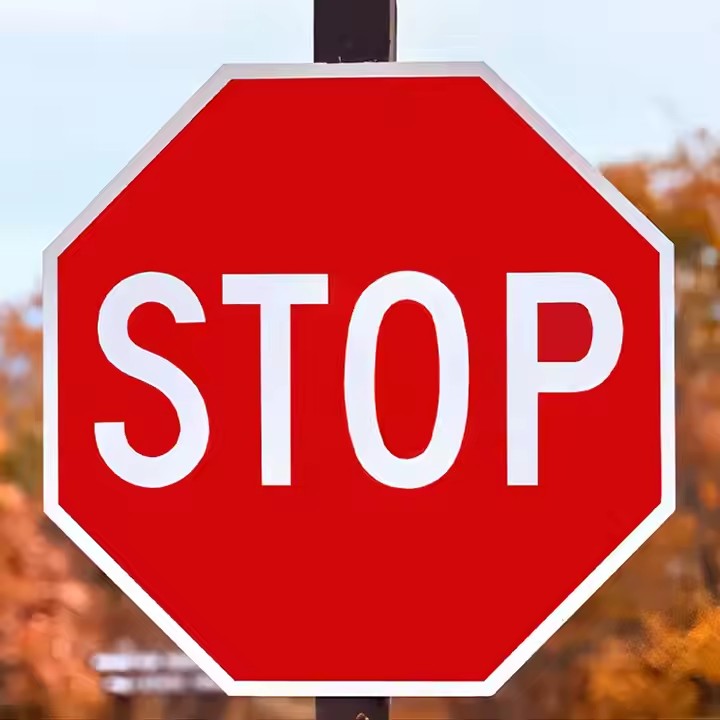 Durable aluminum STOP sign with reflective surface for road safety