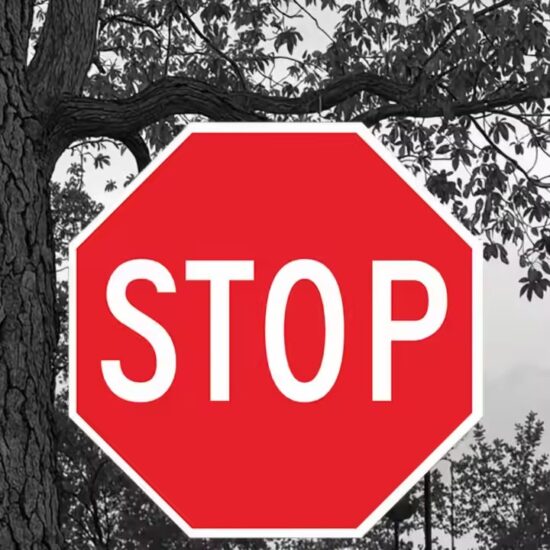 Durable customizable STOP sign with reflective coating for road safety
