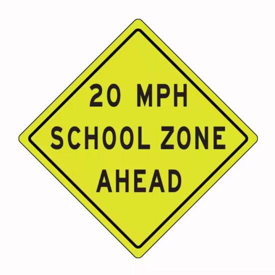 Reflective School Zone Warning Sign Installed by Roadside