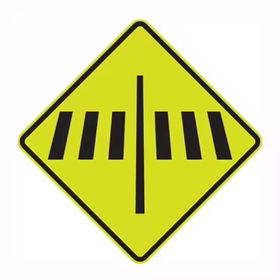 Reflective School Zone Warning Sign Installed by Roadside