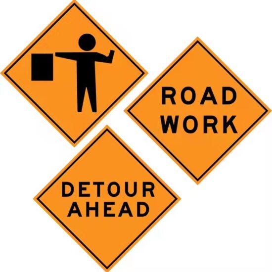 Custom Safety Warning Road Construction Sign in Use on Roadway