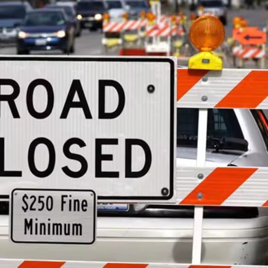 Custom reflective temporary construction traffic management sign