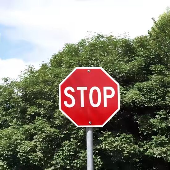 Anti-fade reflective STOP sign for outdoor traffic management