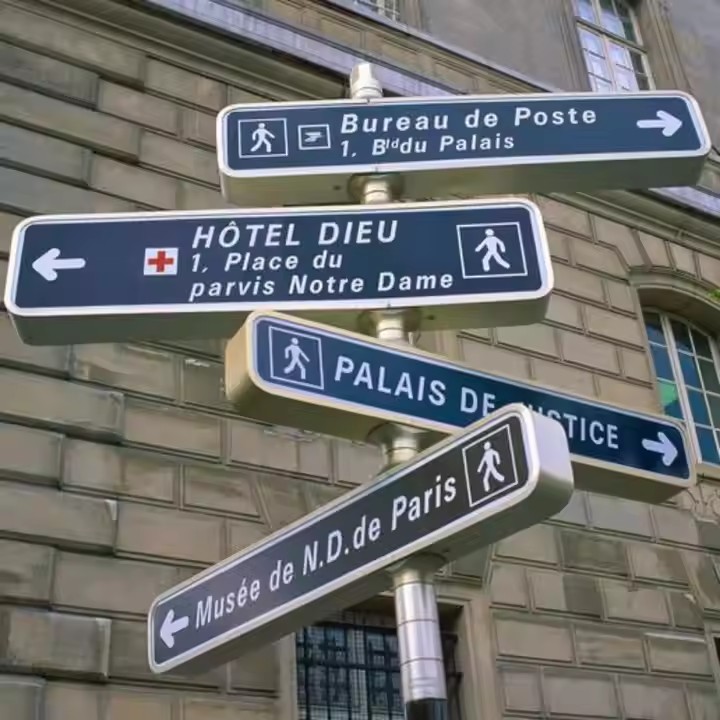 Custom outdoor road sign with reflective graphics installed on roadside